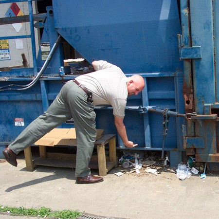 Jim found Destin under this garbage dumpster near his work.