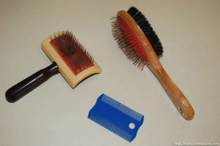 My 3 previous dog brushes... these are NOT the Furminator deShedding tool