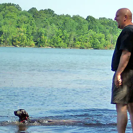 Destin and Jim splashing around in the lake.