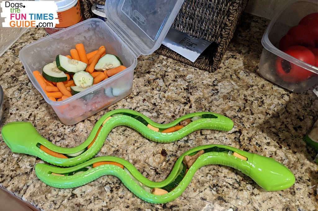Two snake dog treat toys stuffed with crunchy vegetables. photo by Lynnette at TheFunTimesGuide.com Two snake dog treat toys stuffed with crunchy vegetables.