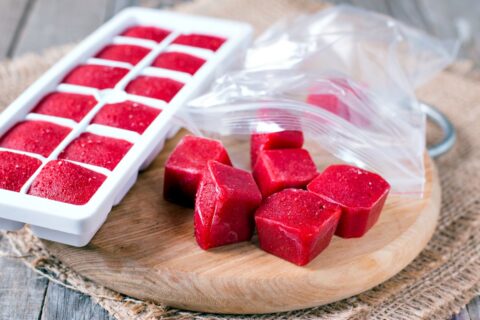 I store dog-friendly leftovers (and overripe fruit/veggies) in ice cube trays. When making homemade dog treats or stuffing Kong toys, I'll toss one inside!