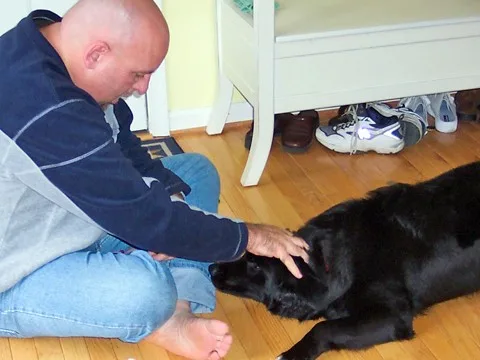 Here you can see that Jim is trying to lightly force Destin to place his head on the floor. (He wasn't doing it too hard -- I promise.)